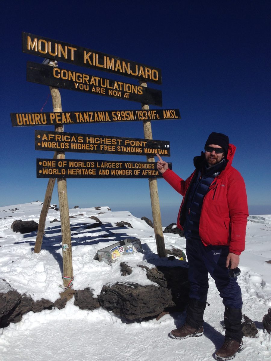Silas J. Lees at the summit of Mount Kilimanjaro, 2015